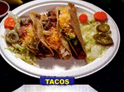 George's crispy tacos with lettuce and jalapeños